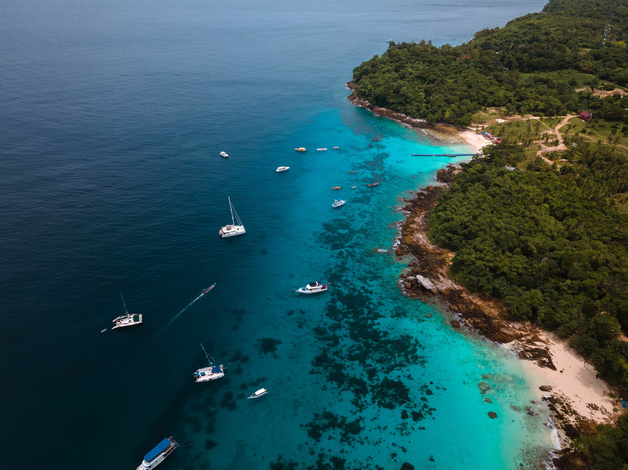 Ter Bay coastline and turquoise water on Racha Yai Island