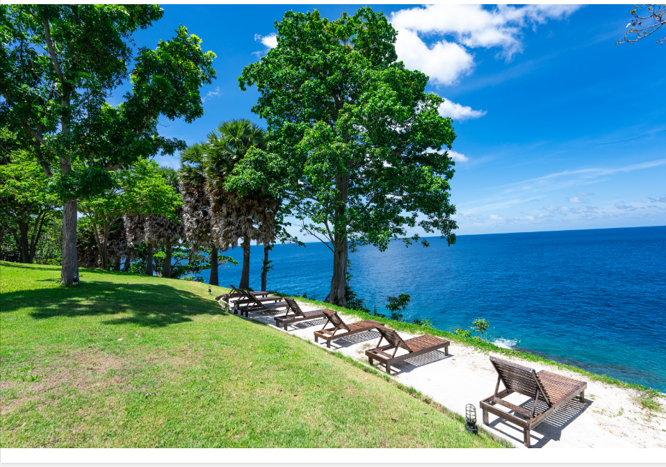 Sea-view garden area at Ban Raya Resort on Racha Island
