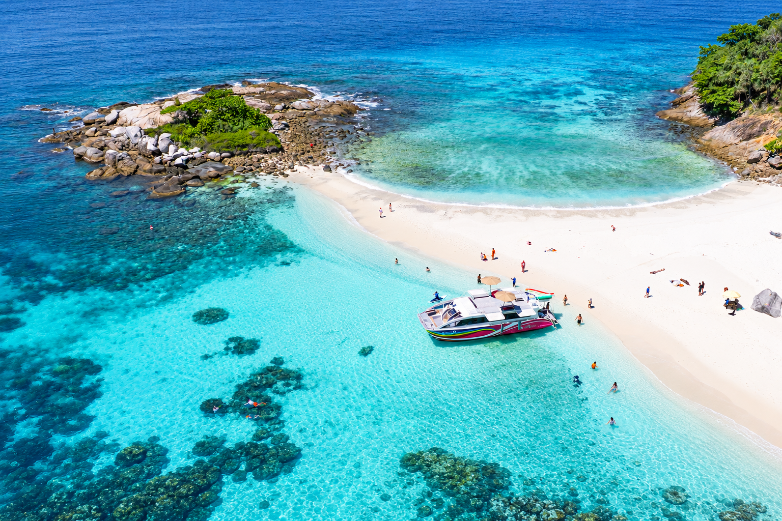 Seastar Rainbow Catamaran beside the shore of Racha Noi Island