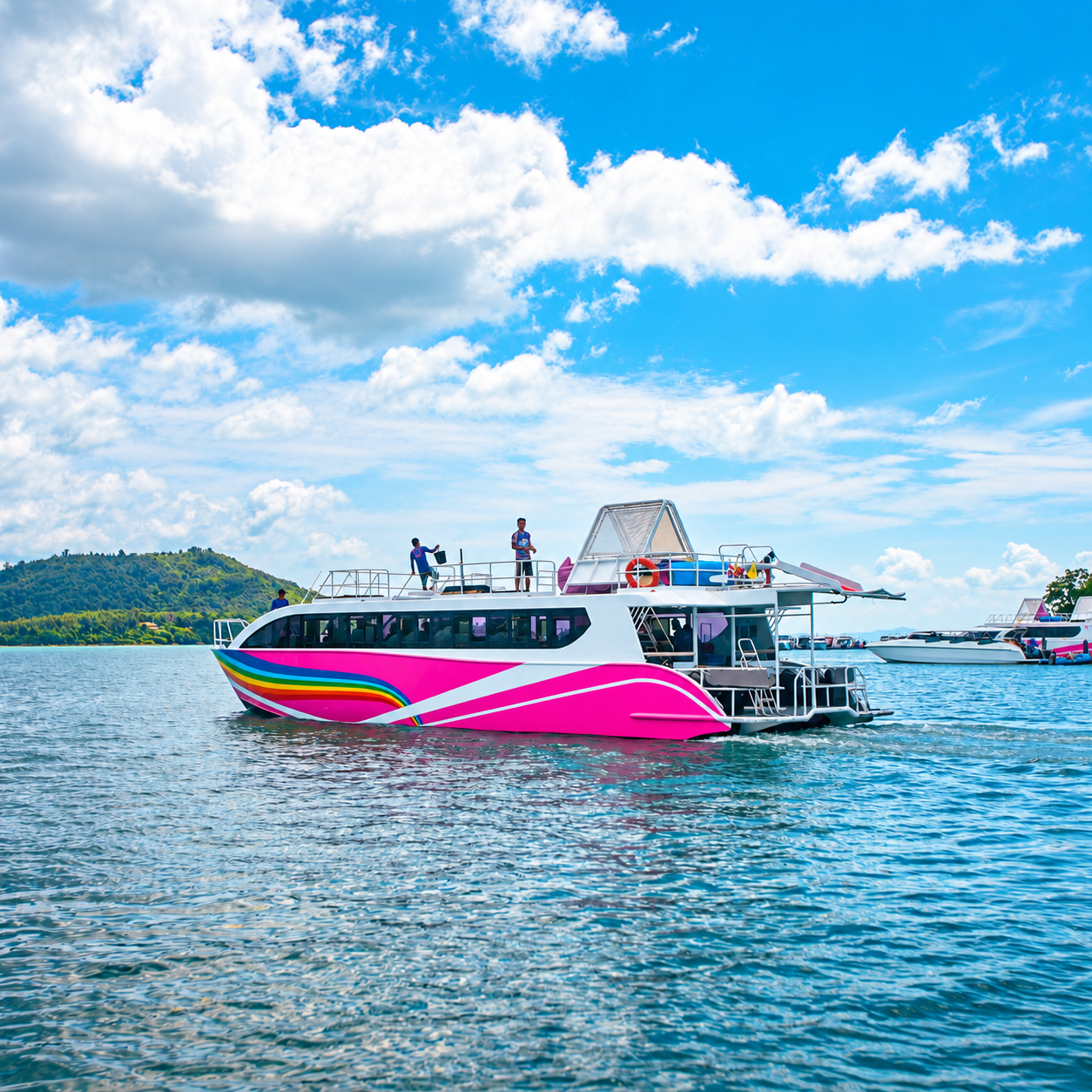 Seastar Rainbow double-deck catamaran on turquoise water near Phuket