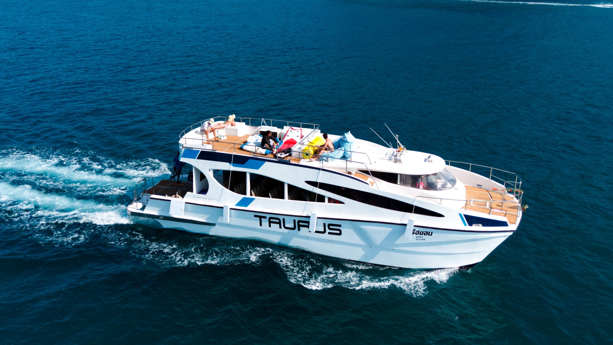 Taurus Speed Catamaran cruising on the sea in Phuket