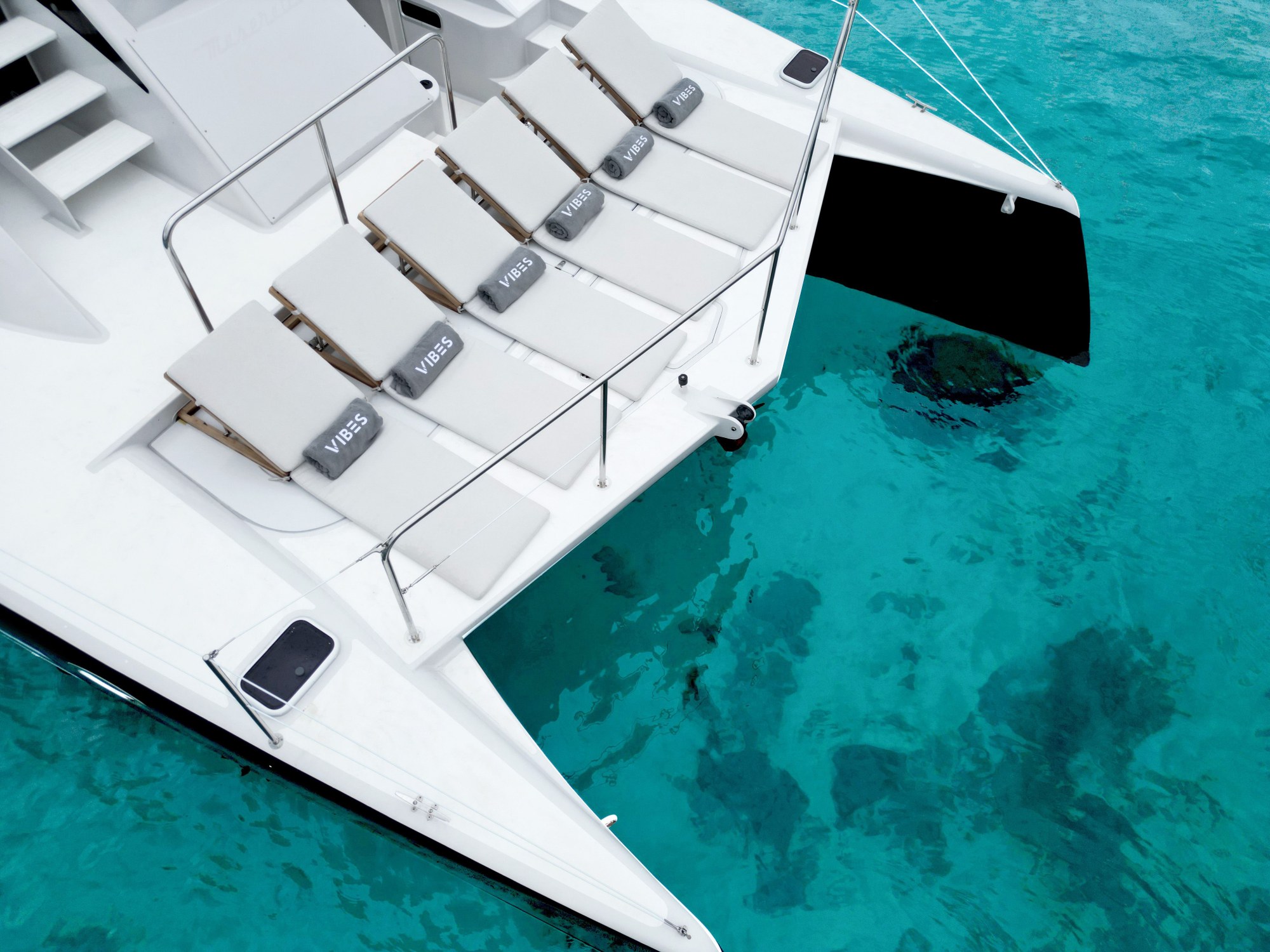 Spacious bow and sun loungers on Vibes Catamaran Yacht